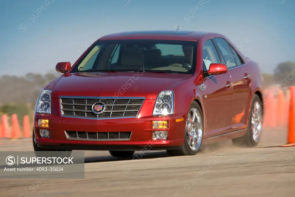 2008 Cadillac STS V6 on a race track, front 3/4
