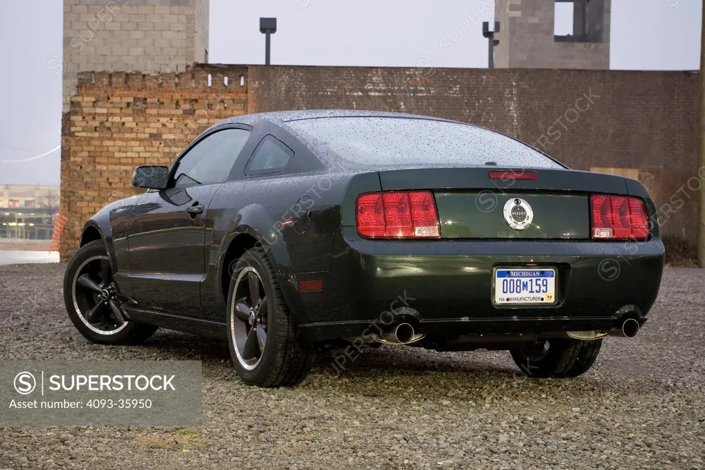 2008 Ford Mustang Bullitt in an urban location, rear 3/4