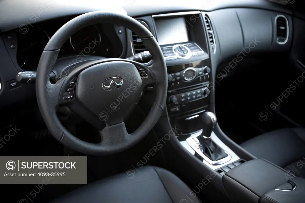2008 Infiniti EX35 showing the front seats, steering wheel, instrument panel, center console and dashboard