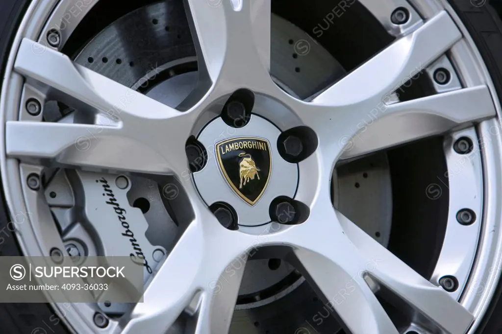 2006 Lamborghini Gallardo Spyder showing the front wheel, rim, brakes and logo badge
