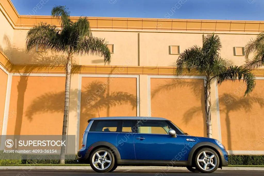2008 Mini Cooper S Clubman parked in front of a suburban commercial building, side view