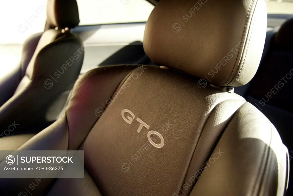 2004 Pontiac GTO showing the badge logo on the seat