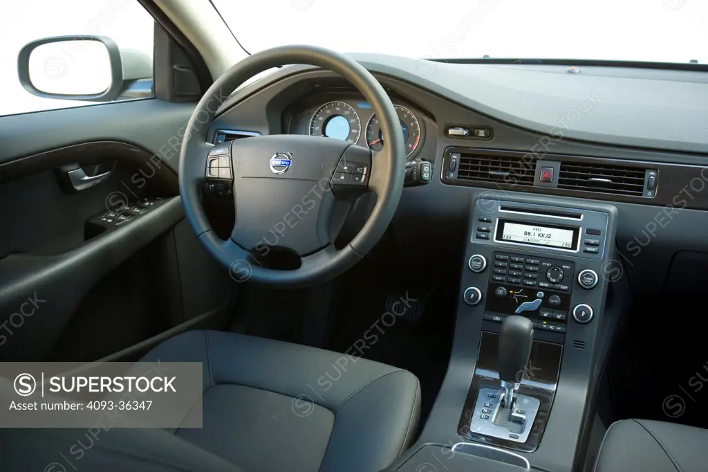 2008 Volvo V70 showing the steering wheel, front seats, dashboard, center console and instrument panel