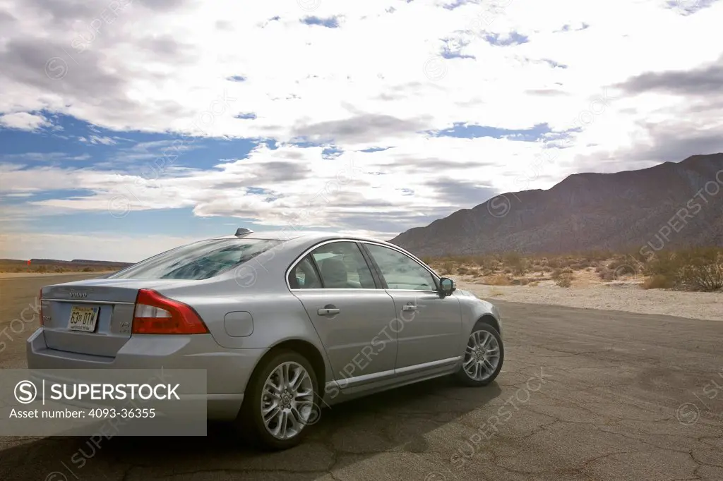 2007 Volvo S80 V8 AWD parked on mountain road, rear 3/4