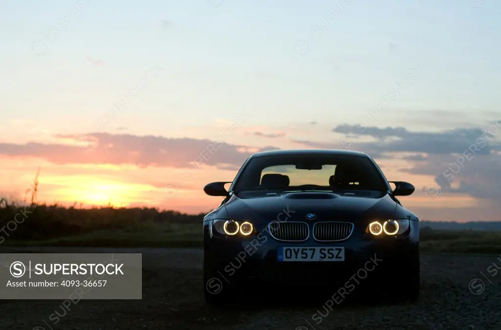2010 BMW M3 E92 front view at dusk