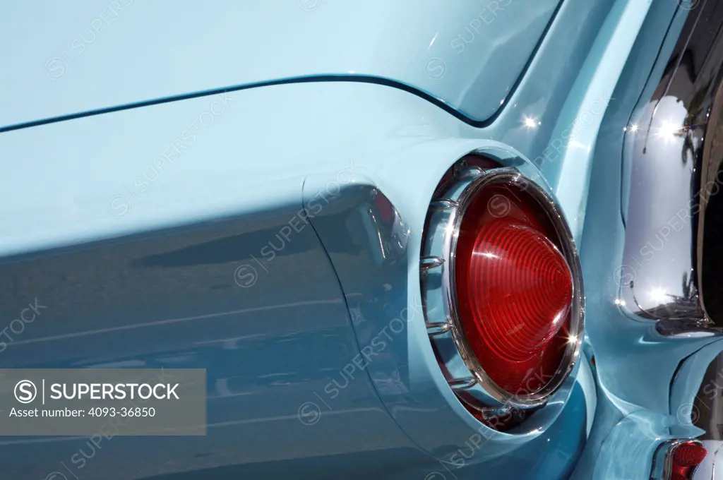 A closeup close-up detailed shot of a 1957 Ford Thunderbird at an auto shot
