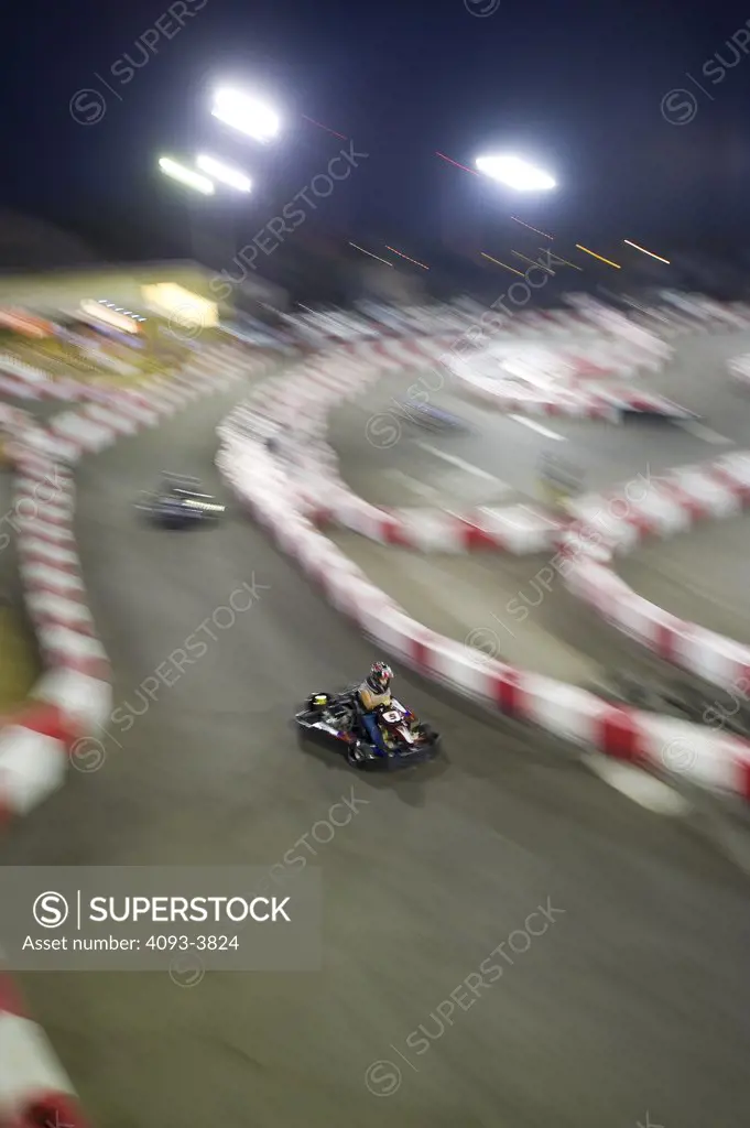 Two Go Karts racing on track