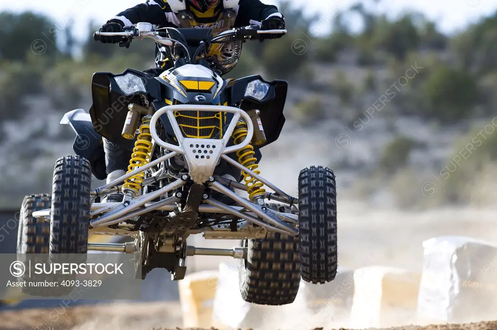 ATV jumping in race