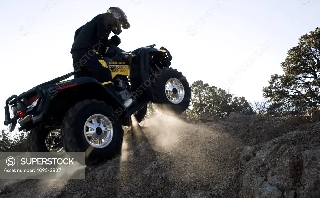 Can-Am ATV riding up hill