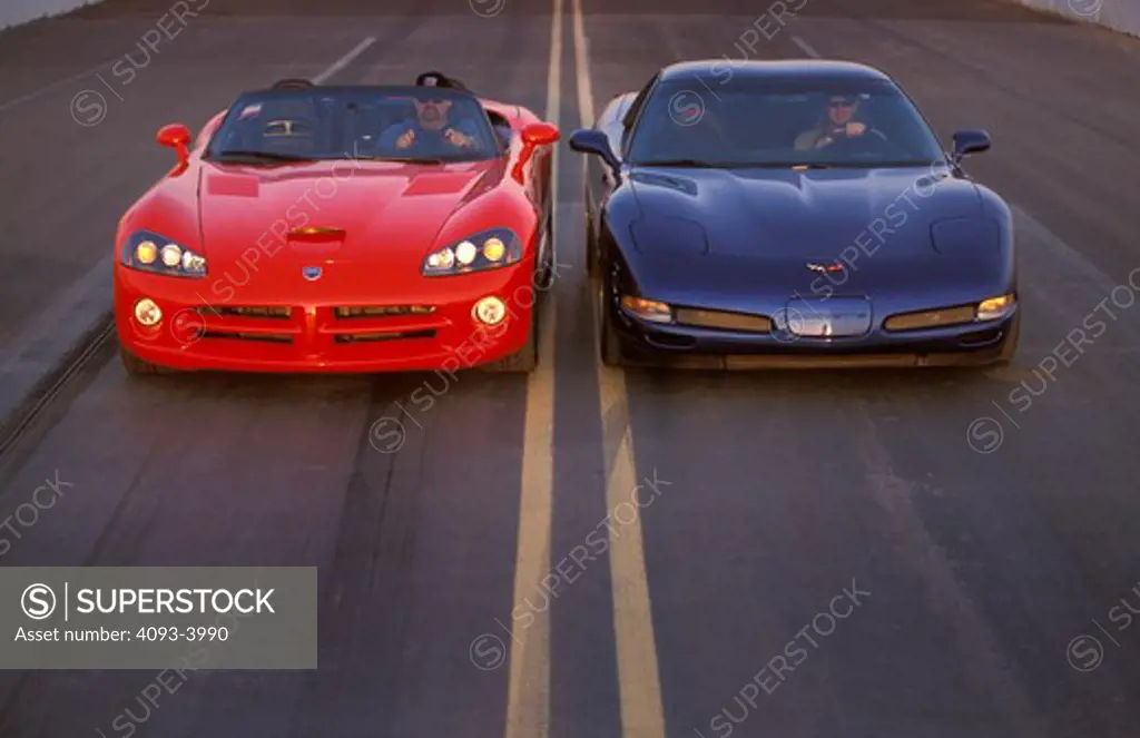 2003 Dodge Viper convertible 2003 Chevrolet Corvette side by next to two different close near