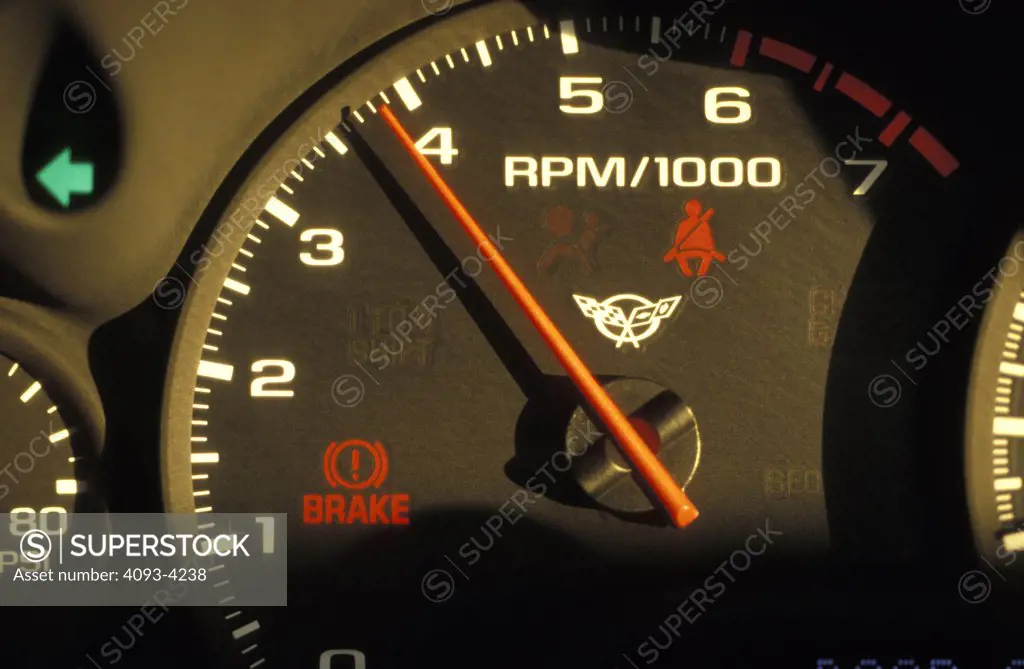 interior detail Corvette 2001 tachometer gauge revving emergency brake warning indicator seat belt light