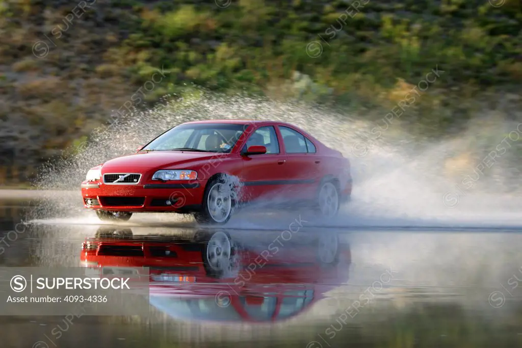 Volvo S60 R 2005 red skidding sliding splash spray reflection
