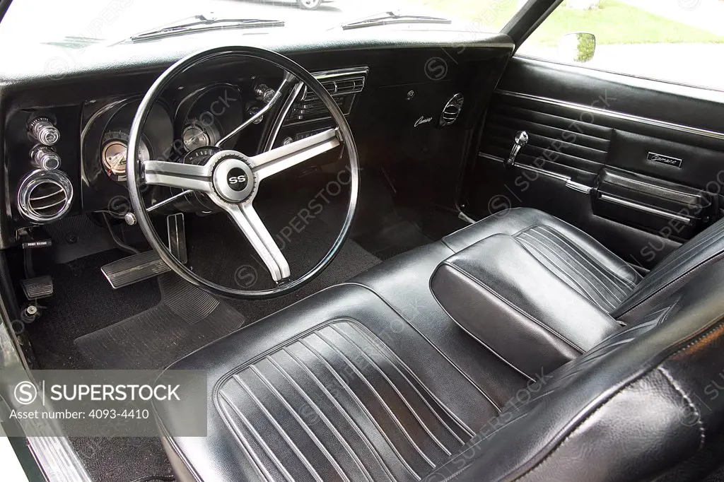 interior Camaro SS 1968 black leather seats steering wheel gauges