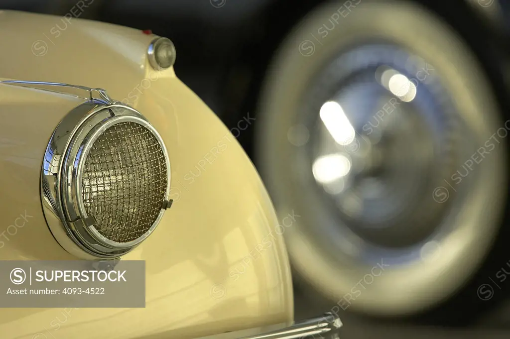 detail Jaguar XK120 white headlight wheel