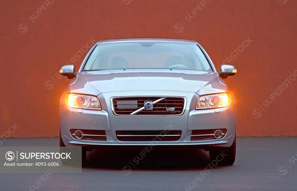 2008 Volvo S80 front Nose view in front of a red wall