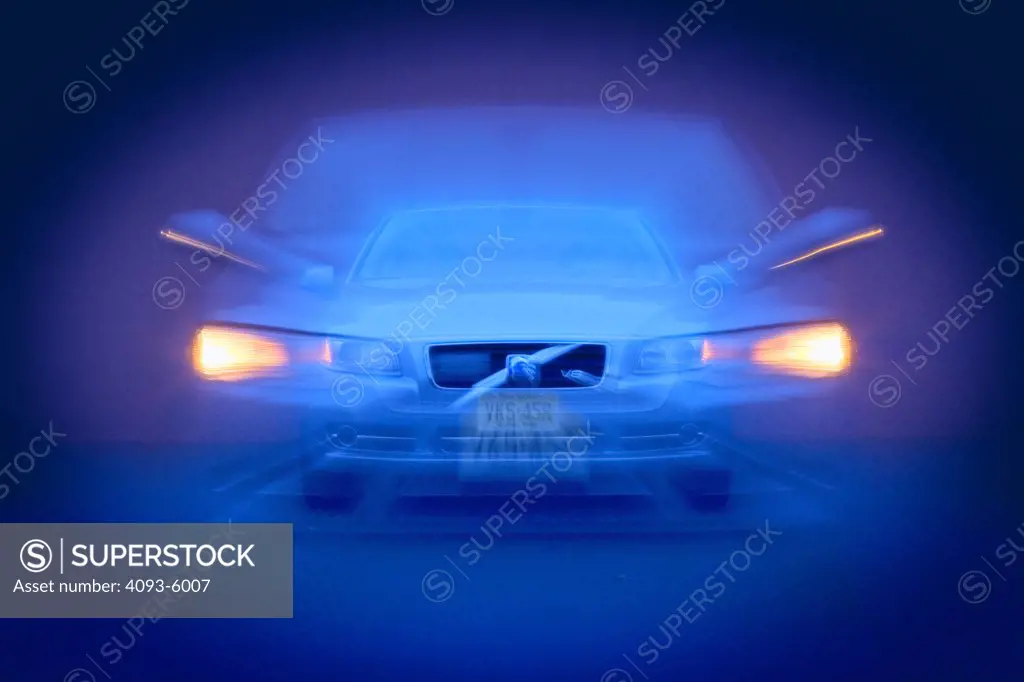 2008 Volvo S80 in all blue, motion blur with zoom