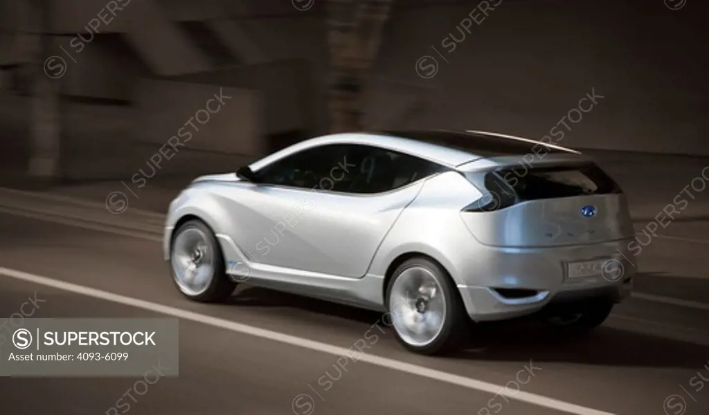2009 Hyundai HCD-11 Nuvis Concept car driving through city, rear 7/8