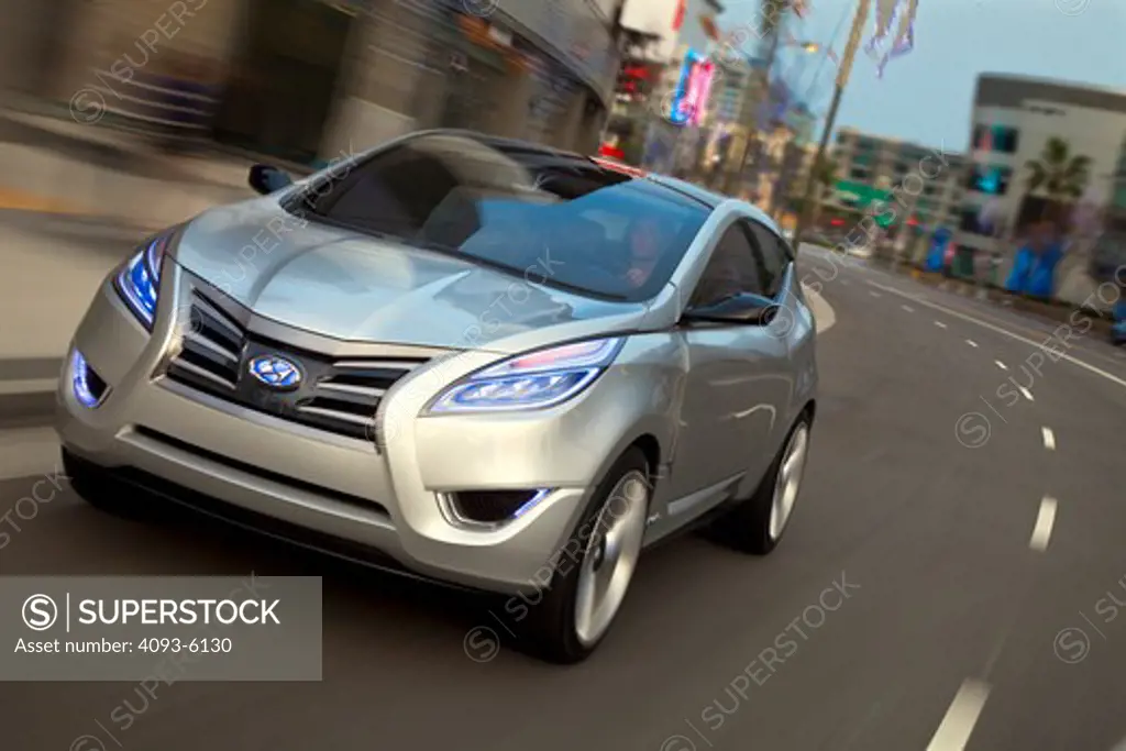 2009 Hyundai HCD-11 Nuvis Concept car on the road in city, front 3/4