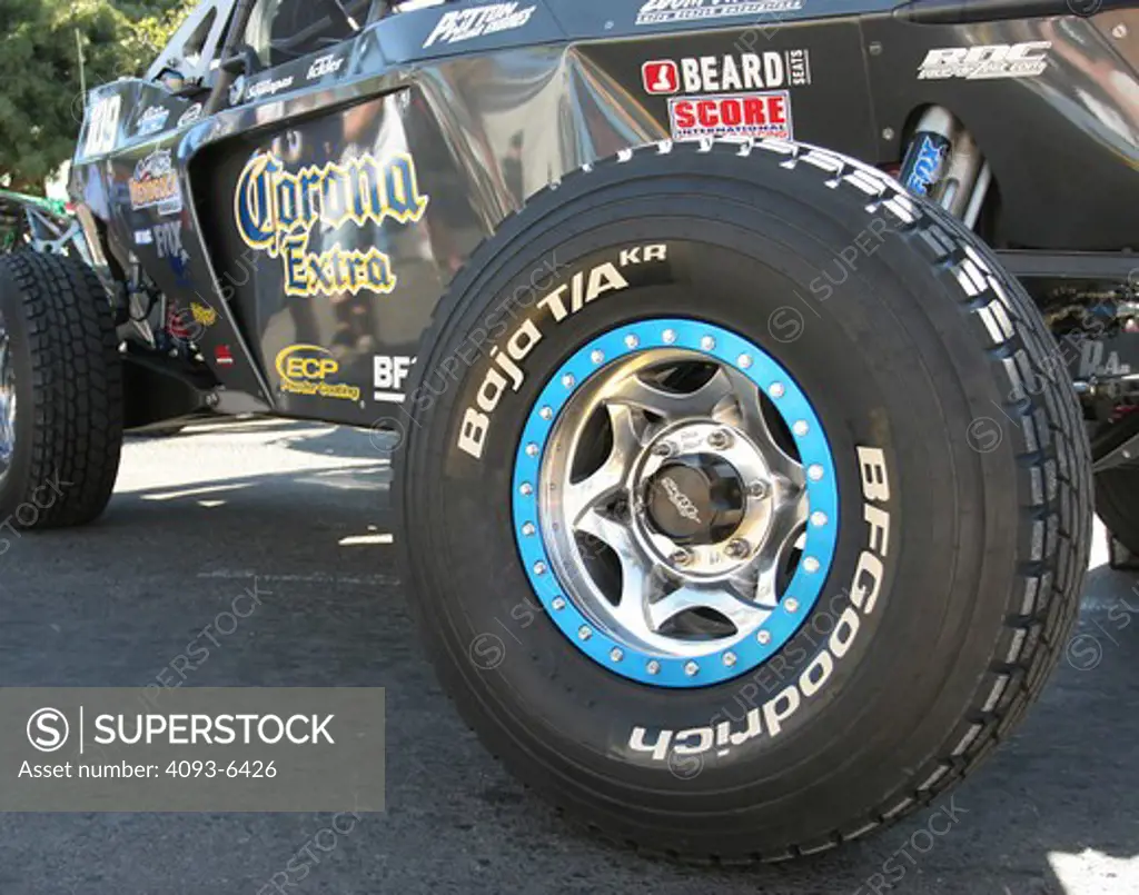 Baja racing truck custom modified vehicle close up of wheel tire rim Baja traction