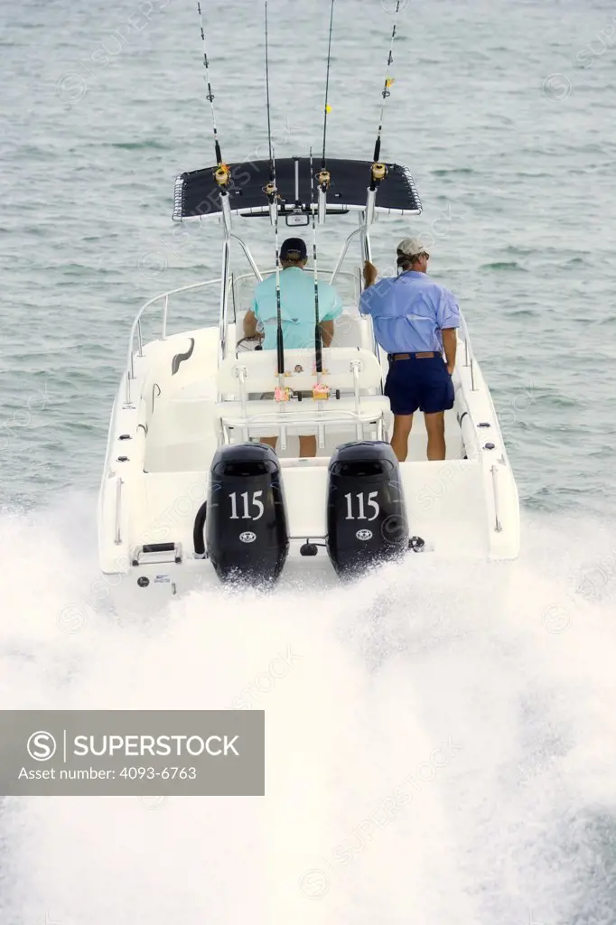 Sun Chaser outboard motors wake men
