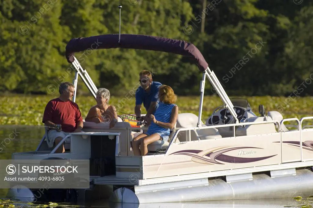 Two couples fishing on Sylvan lake, Indiana MR:Y Nissan 30 four stroke engine Manitou pontoons Winston Luzier