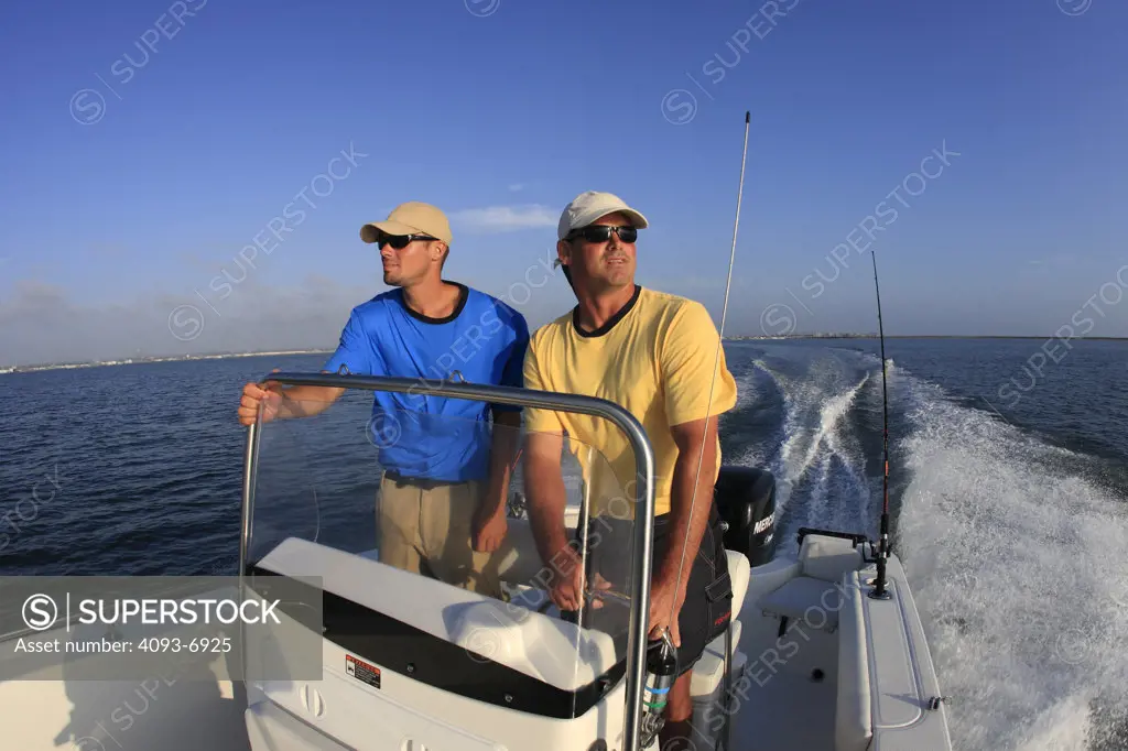 Friends / Guys going fishing on a Trophy 1703 Center Console boat. Pacific Ocean, near San Diego Harbor, CA.
