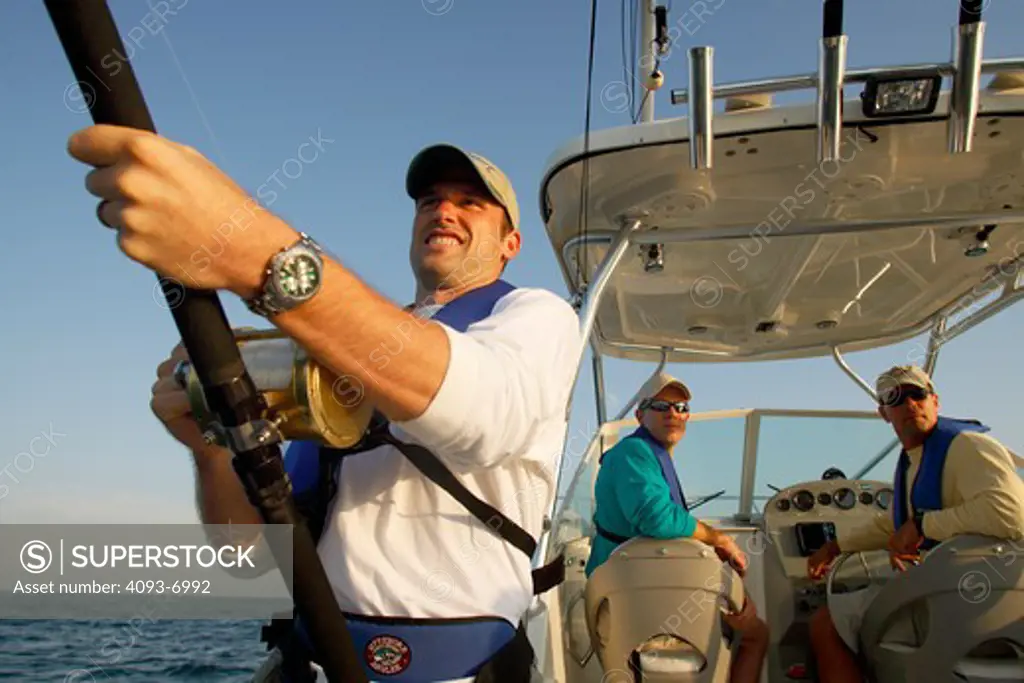 Guys / friends fishing from their Trophy 2052 boat offshore in the Pacific Ocean near San Diego, CA.