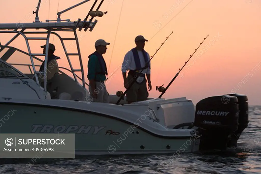 Guys / friends fishing from their Trophy 2052 boat offshore in the Pacific Ocean near San Diego, CA.