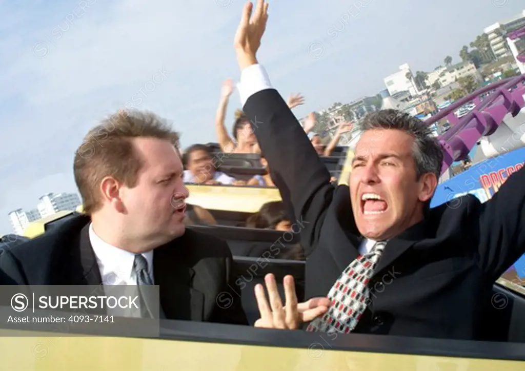 two guys business men arms up air scared happy rollercoaster excited fair pier