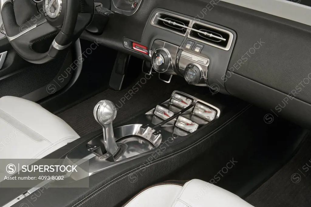 Interior view of a Chevy Camaro Convertible concept car. inside dash gears shifter panel