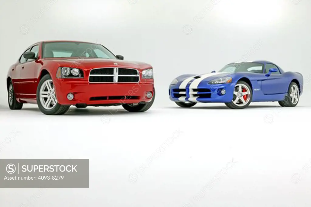 2008 Dodge Charger RT in a studio with a 2008 Dodge Viper
