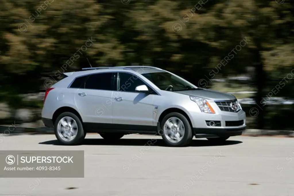 2010 Cadillac SRX driving along country road