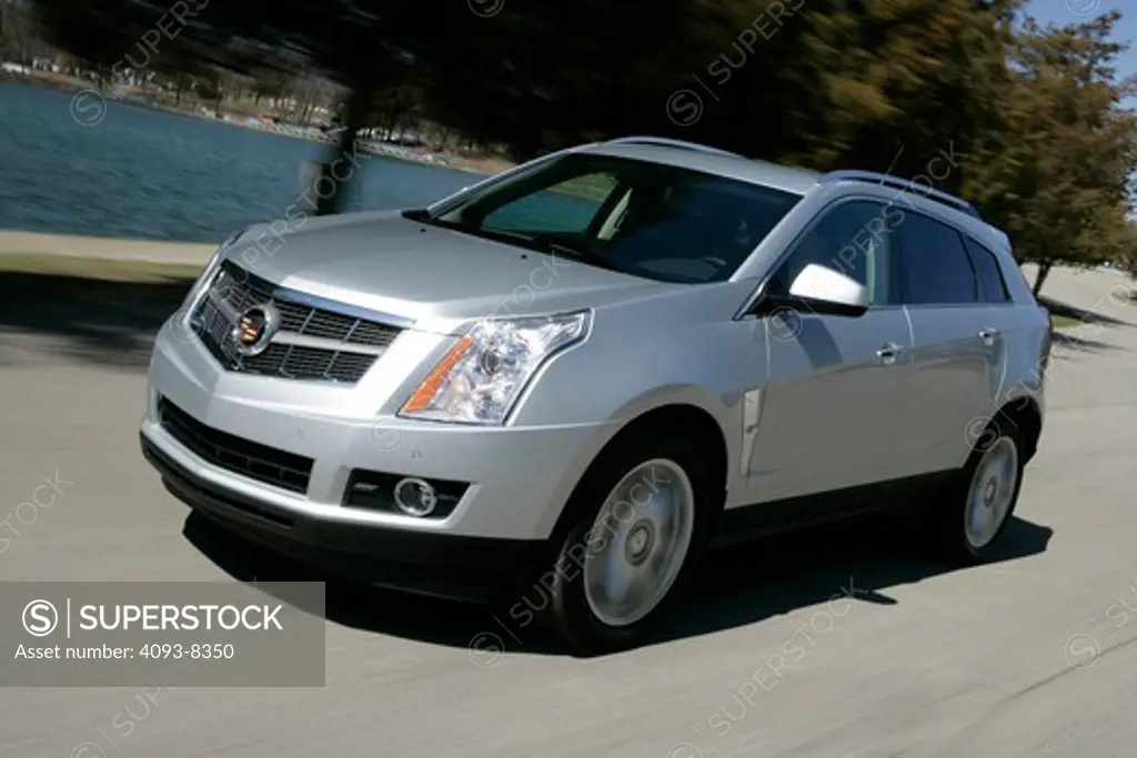 2010 Cadillac SRX driving along country road