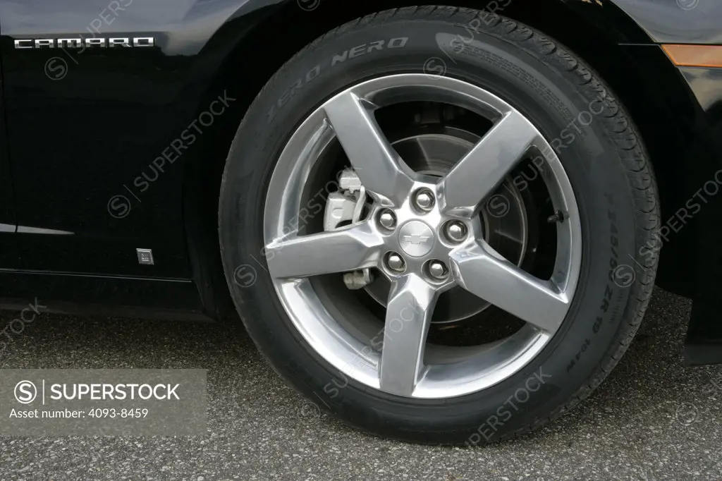 2010 Chevrolet Camaro wheel rim and tire, close-up