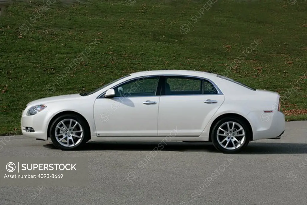 2010 Chevrolet Malibu parked on road, side view