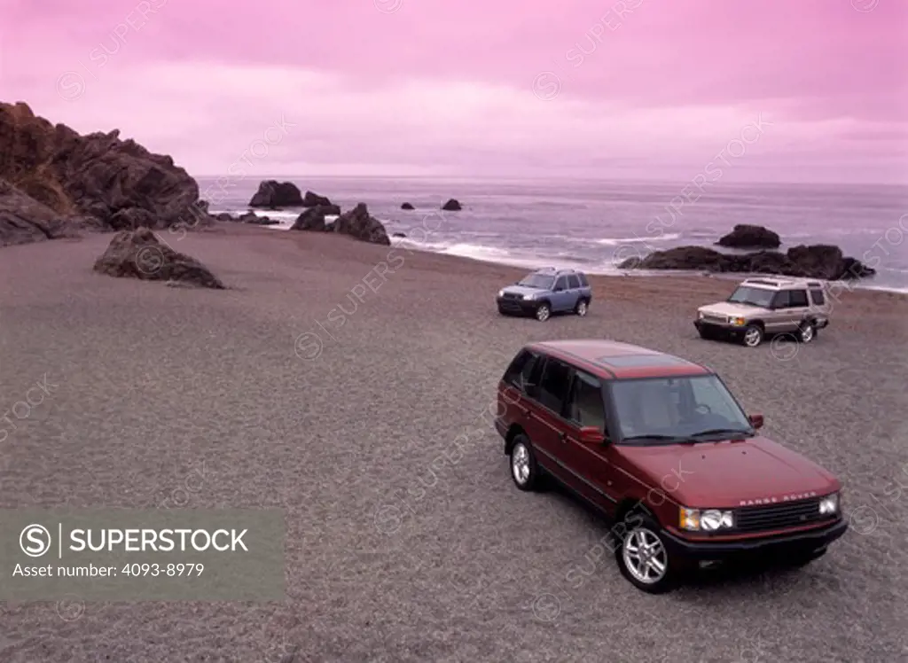 Land Rover Discovery Freelander Range Rover 2001 red sand beach street