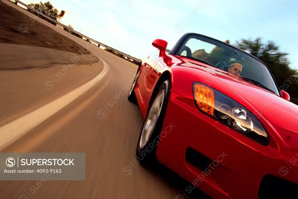 Honda S2000 2000 red detail front 3/4 nose headlight curve street