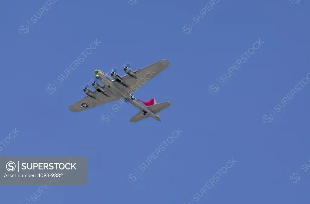 Prop Military Fixed Wing Boeing Aviat Airplanes B-17G Flying Fortress WWII bomber sky below underneath