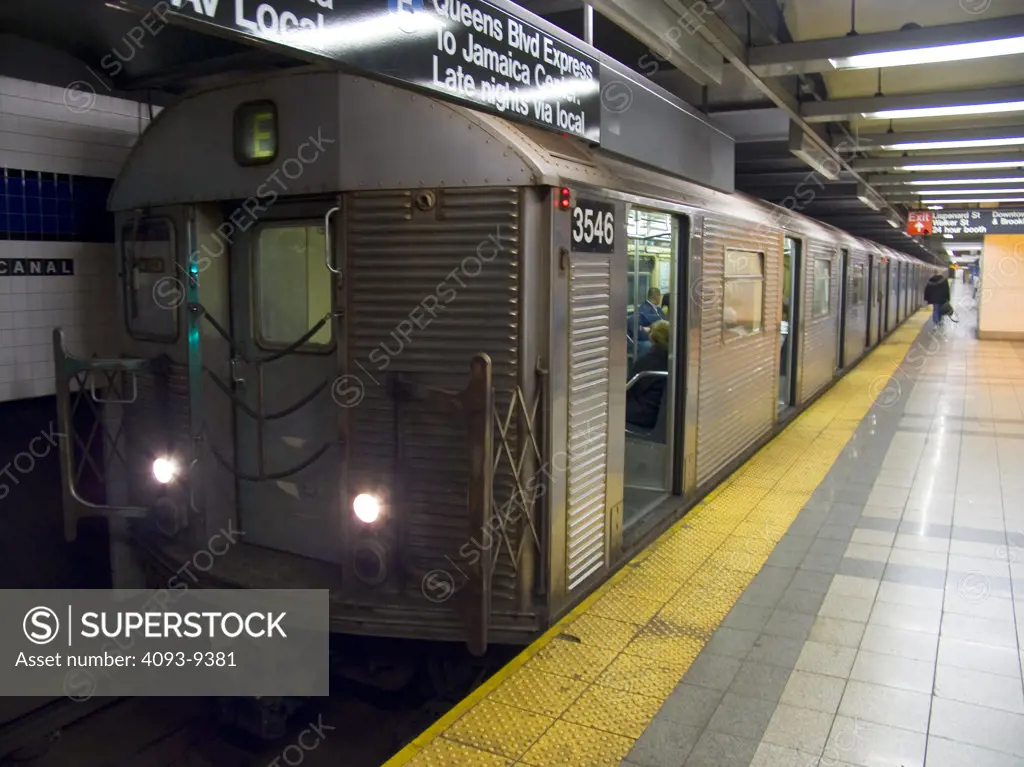 subway New York City station platform open doors E Train city
