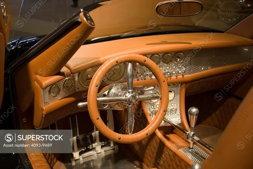 interior Spyker C8 Spyder 2006 brown leather dash metal trim steering wheel