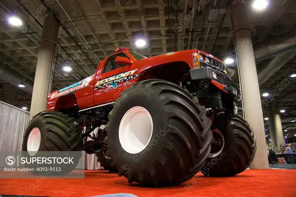 low angle Silverado monster truck red