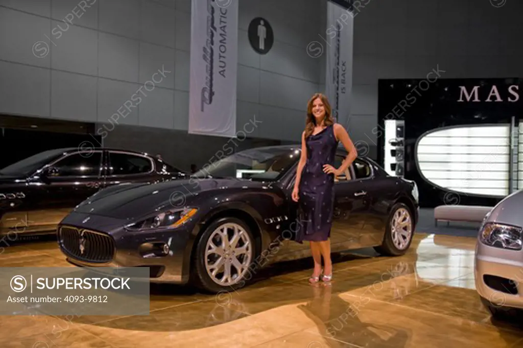 2008 Maserati GranTurismo in the LA Auto Show with a female model