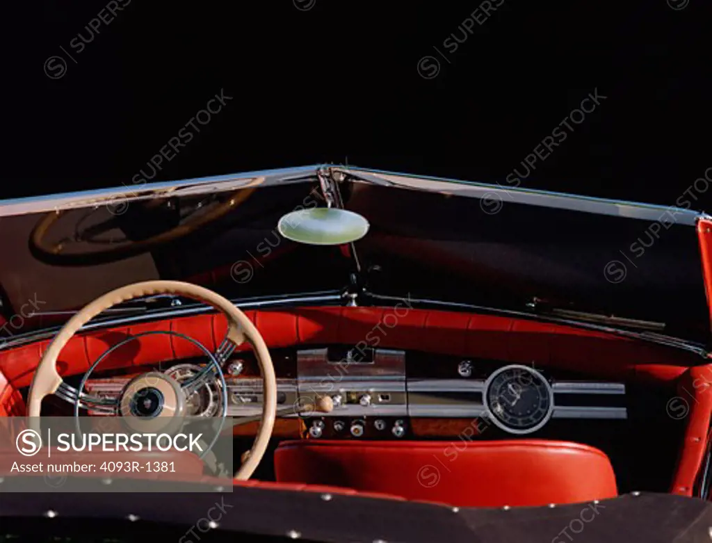 interior detail Packard 1936 1930s red steering wheel dashboard clock IP instrument panel gear shift rear view mirror street