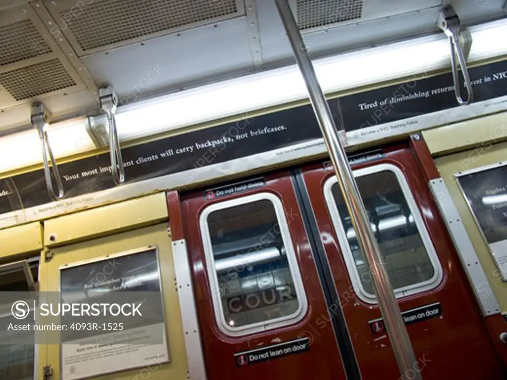 interior subway New York City pole doors rail city