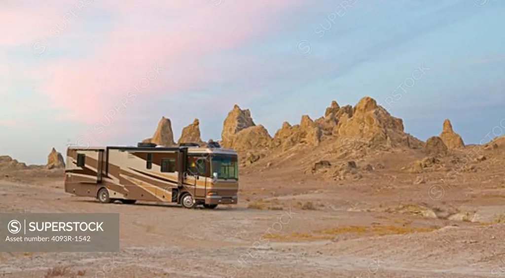 2005 brown Fleetwood Providence RV. Parked at Trona Pinnacles National Monument. Camping. Sunset.