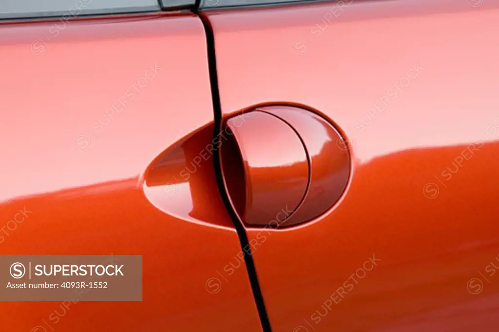 detail Mitsubishi Eclipse 2006 orange door handle