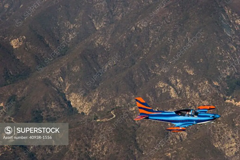 Marchetti SF-260 SF260 flying over the mountains of Southern California.