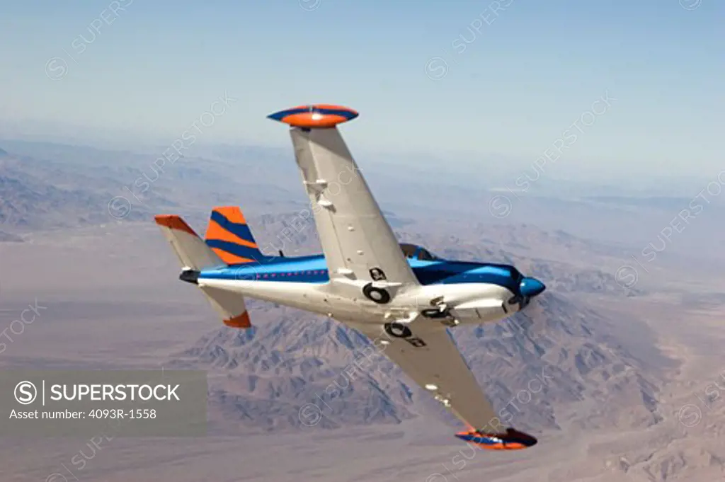 Marchetti SF-260 SF260 performing a break / wing-over. Over the deserts of Southern California.