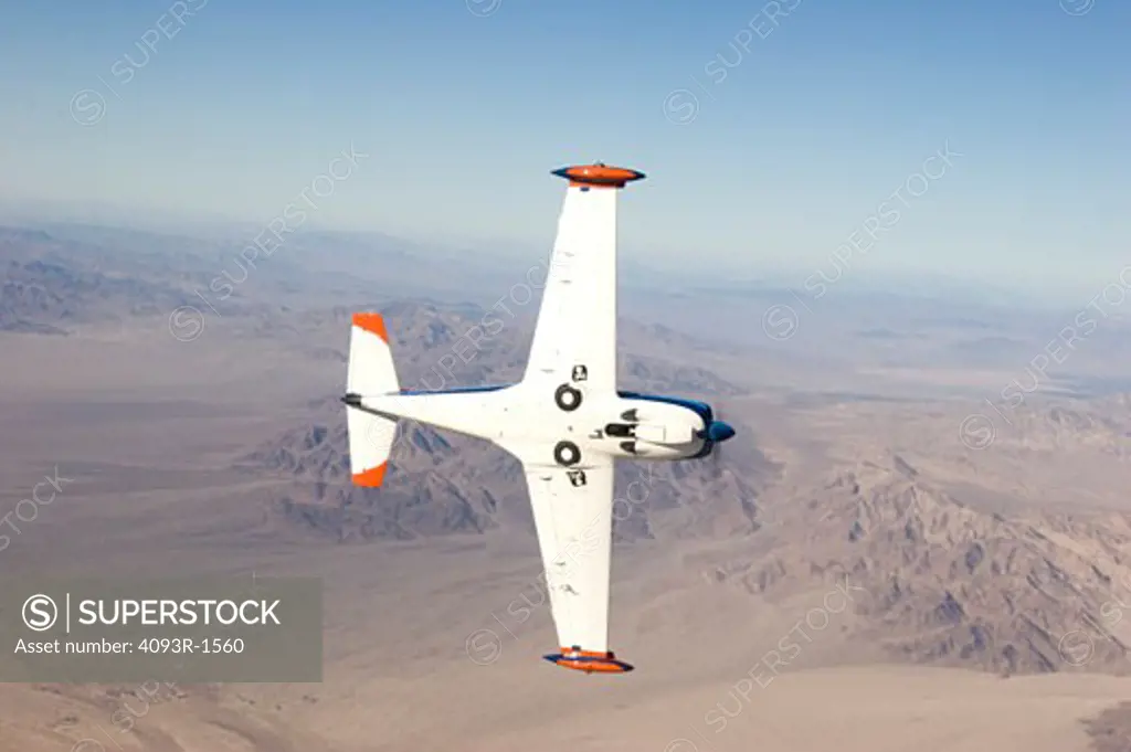 Marchetti SF-260 SF260 performing a break / wing-over. Over the deserts of Southern California.