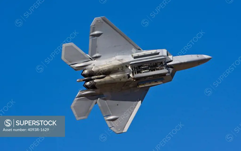 US Air Force Lockheed Martin Boeing F-22 Raptor performing an aerial demonstration at the 2008 Reno Air Races. It is primarily an air superiority fighter. Showing it's missle bays open during a fly-by. US Air Force Lockheed Martin Boeing F-22 Raptor performing an aerial demonstration at the 2008 Reno Air Races. It is primarily an air superiority fighter. Showing it's missle bays open during a fly-by.